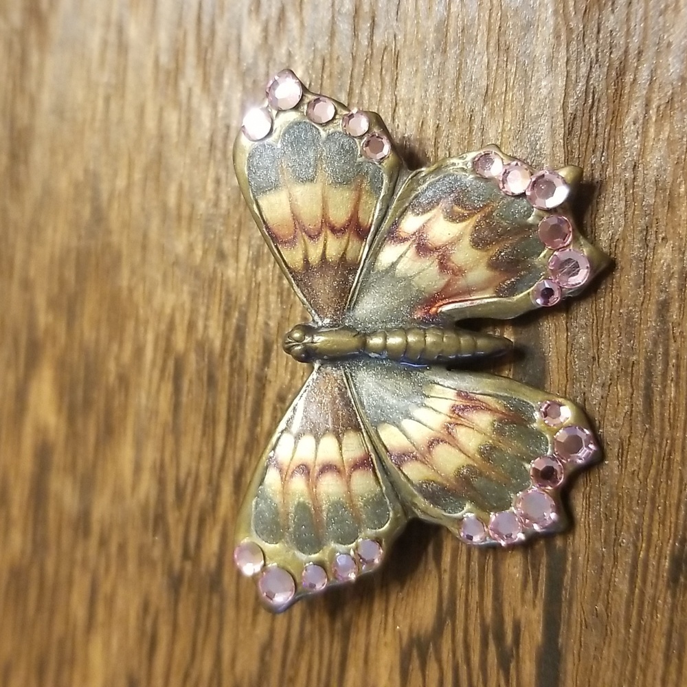Butterfly pin with pink sparkle